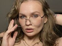 camgirl playing with sextoy KattyWests